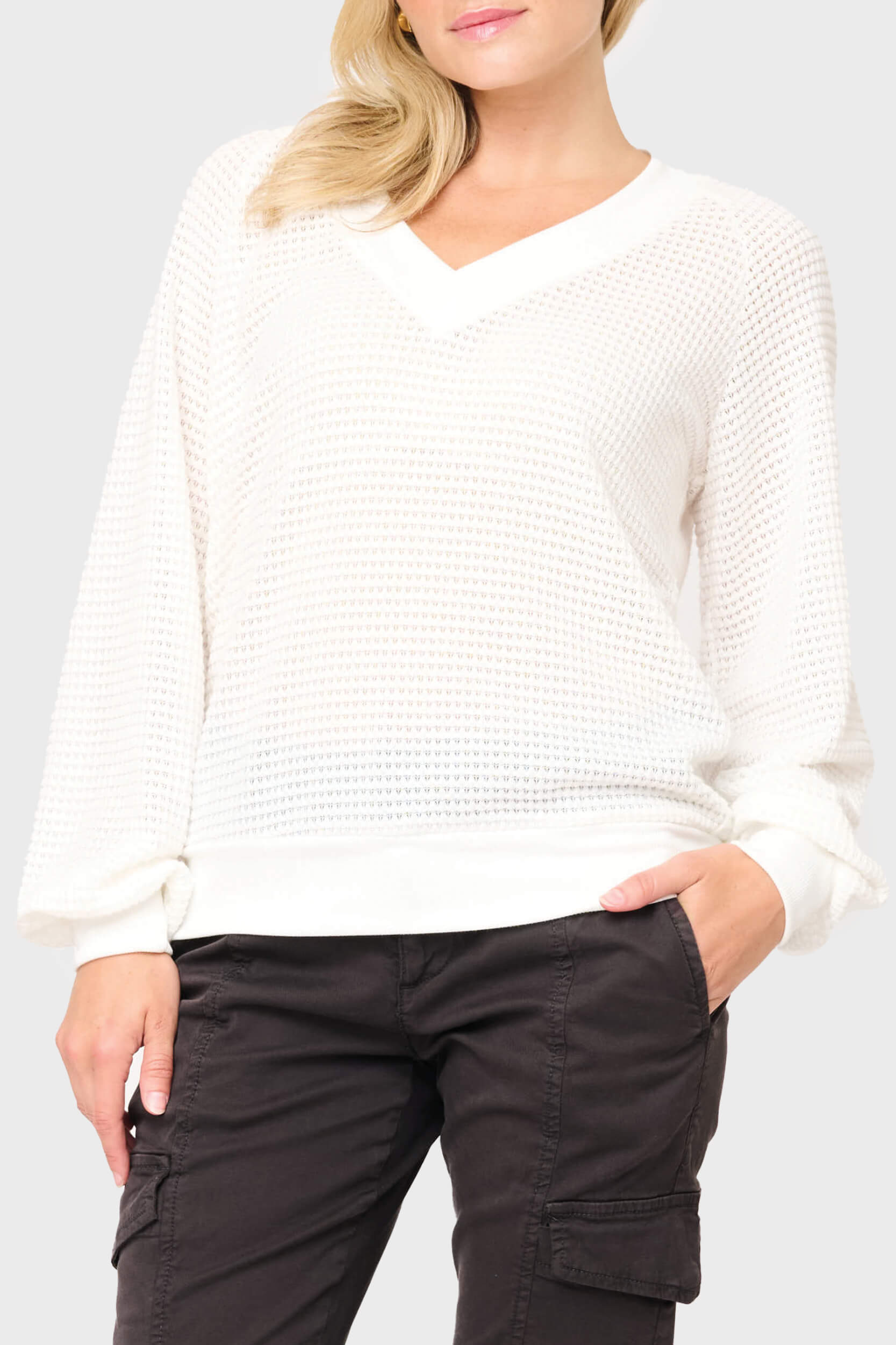 Woman modeling Courtside Open Weave Sweater in White styled for a casual weekend
