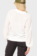 Back of Woman modeling Courtside Open Weave Sweater in White styled for a casual weekend