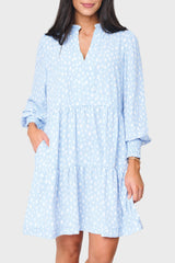 Woman modeling Long Sleeve Decked Out Day Dress in light blue animal print dot styled for work and parties