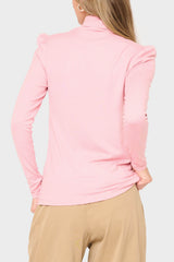 Back of Woman modeling Essential Turtleneck Soft Sweater Knit Top With Puff Sleeve in Pink styled business casual