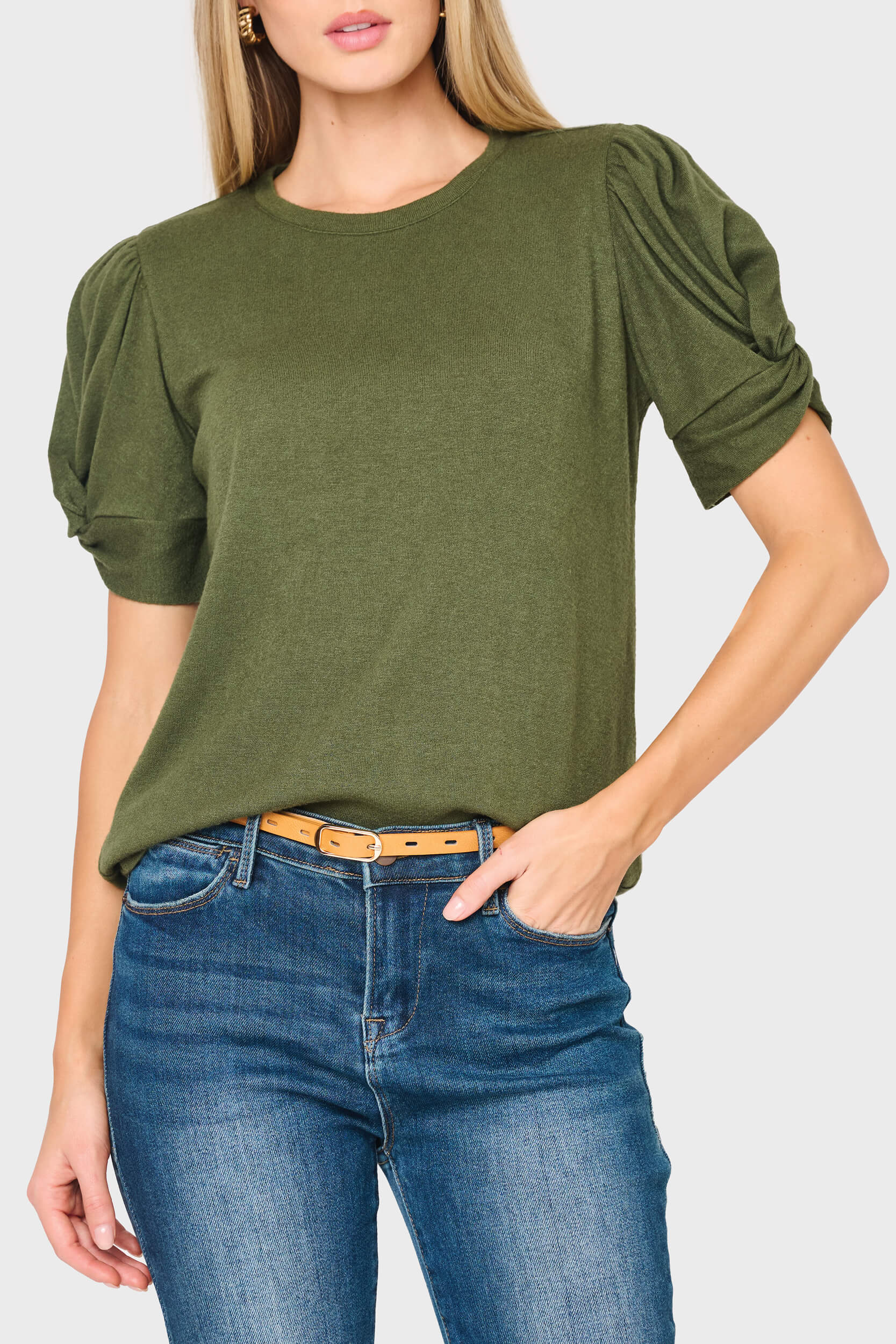 Woman modeling Twist Sleeve Luxe Tee in Olive green styled for work, date night, and everyday