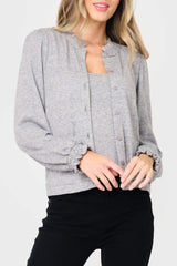 Woman modeling Feminine Mock Neck Luxe Cardigan in Heather Grey styled business casual for work