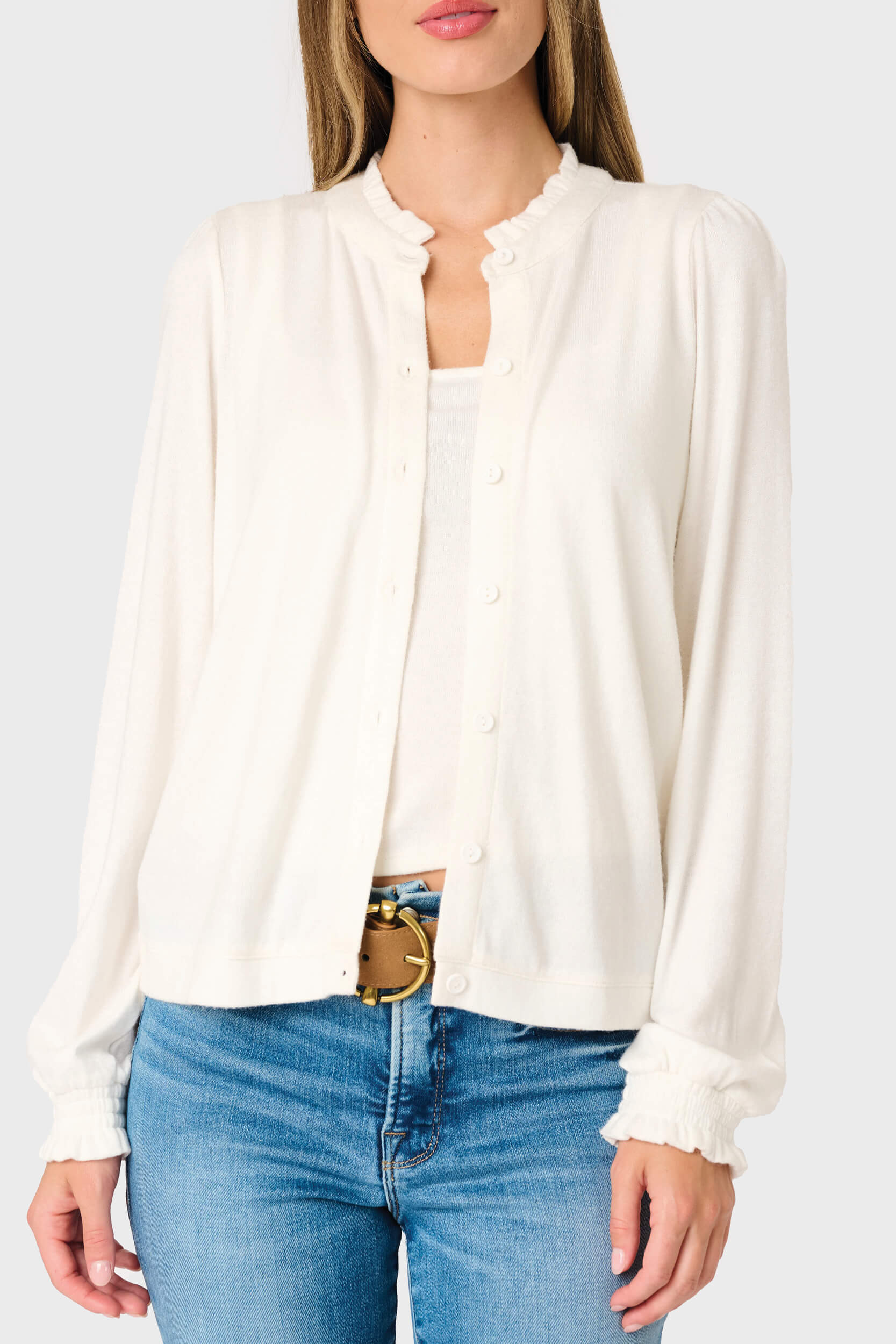 woman modeling Feminine Mock Neck Luxe Cardigan in Ivory white, styled business casual