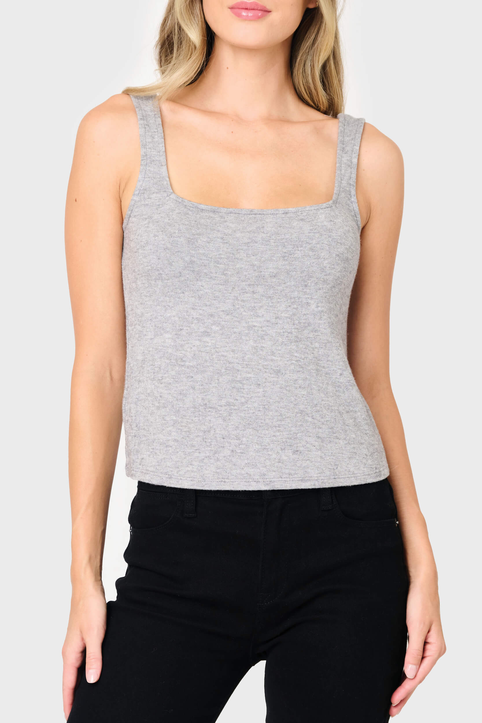 Woman modeling Feminine Luxe Sweater Tank in Heather Grey styled comfy casual