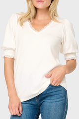 Woman modeling Lace Trim V-Neck Luxe Sweater Top in White styled everyday casual