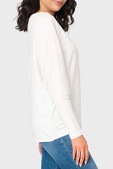 Side of Woman modeling Slouchy Luxe Open Neck Sweater in Ivory styled for everyday and business casual