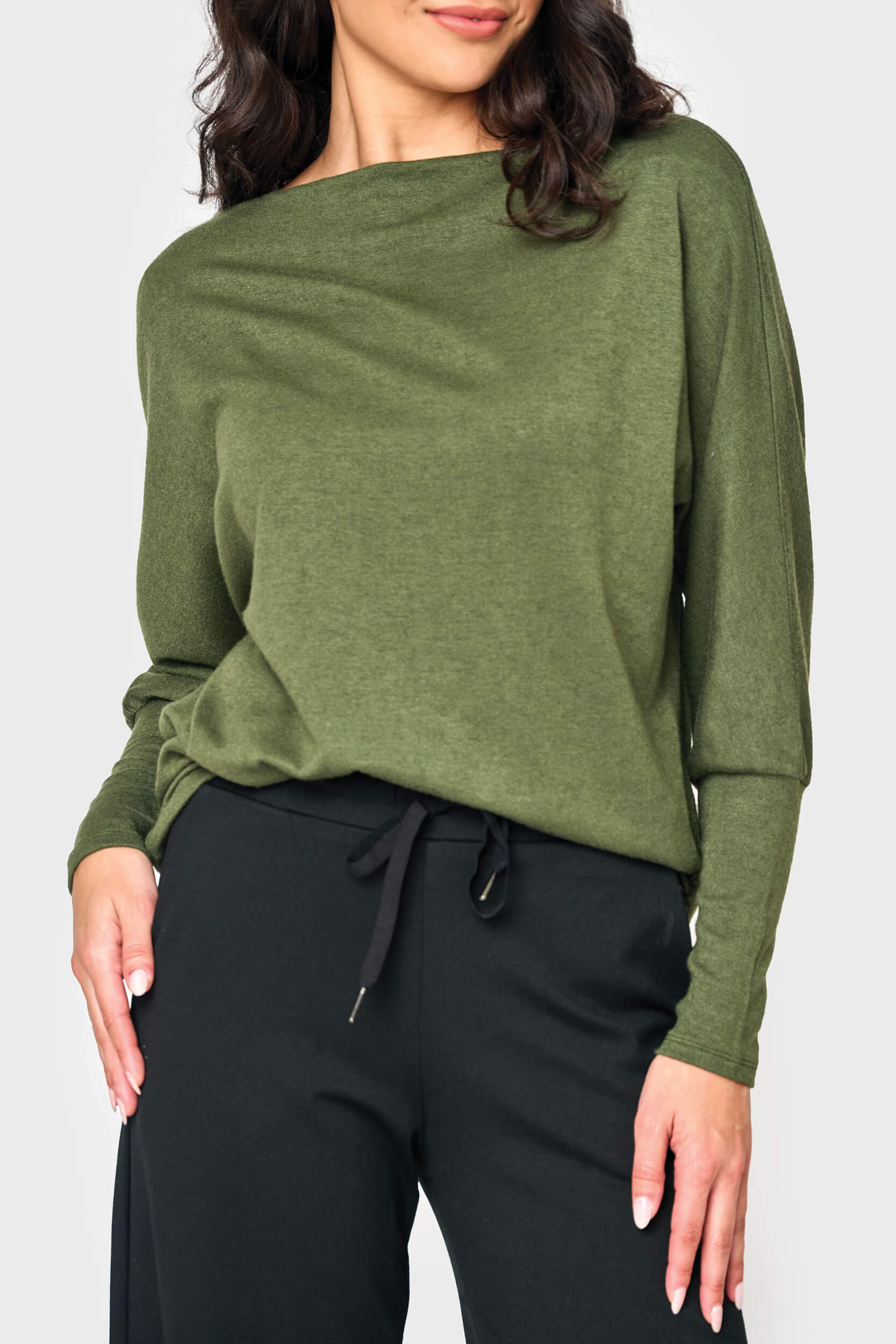 Woman modeling Slouchy Luxe Open Neck Sweater in Olive Green styled weekend casual