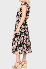 Side of Woman modeling Sweetheart Pin Dot Flutter Sleeve Dress in Black Pink Floral styled business casual for work