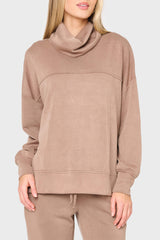 woman modeling cloud scuba mock neck top with matching pant styled for lounging