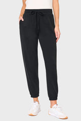 Woman modeling Cloud Scuba Easy Everywhere Jogger Pant styled for traveling