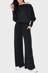 Woman modeling Cloud Scuba Slouchy Everywhere Jumpsuit in black style casual for travel and weekends