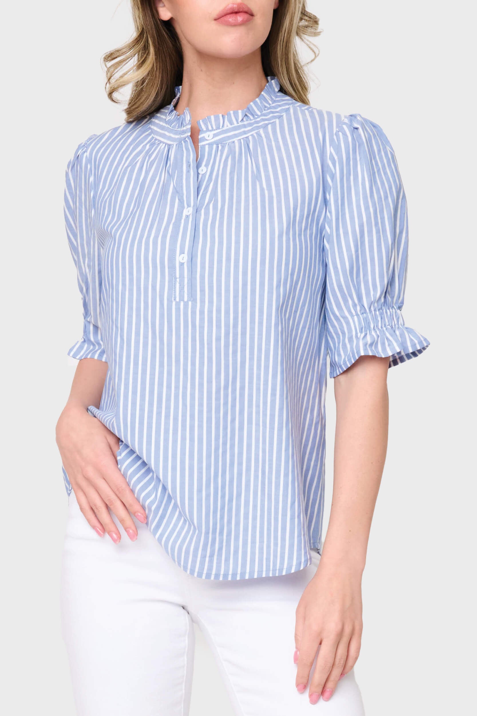 Model wearing Dianthus Henley Puff Sleeve Striped Blouse in Blue White stripe styled business casual