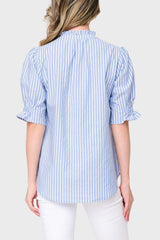 Back of Model wearing Dianthus Henley Puff Sleeve Striped Blouse in Blue White stripe styled for work