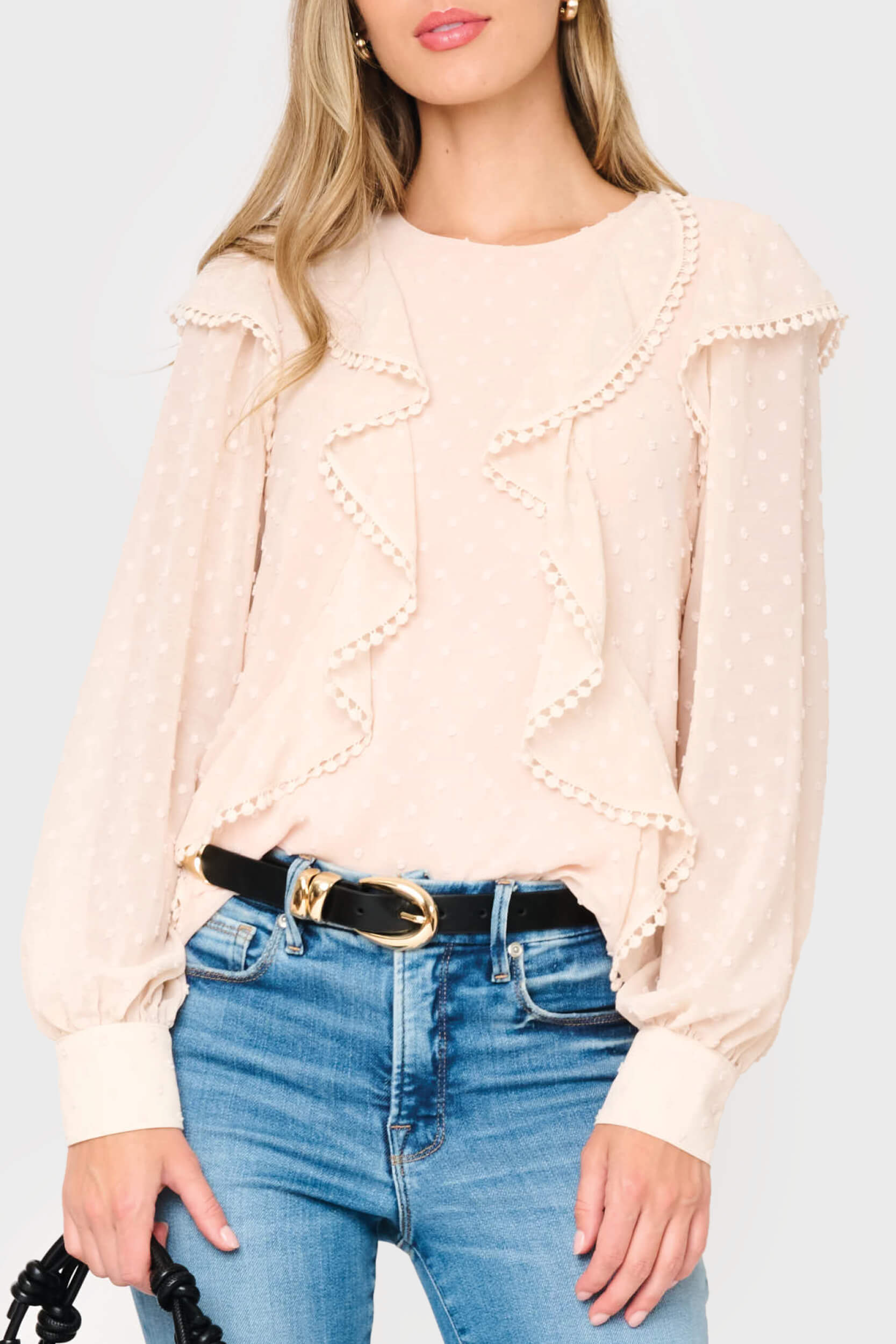 Woman modeling Ophelia Ruffle Boho Blouse in light pink styled business casual