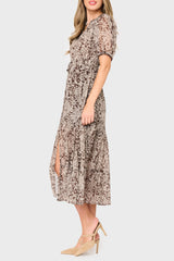 Side of Woman modeling Kira Drawstring Midi Dress in Java Floral brown styled business casual