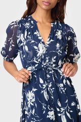 Detail of Woman modeling Kira Drawstring Midi Dress in Navy White Floral