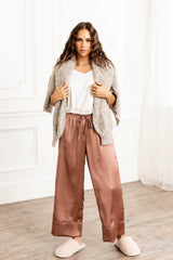 Front of Woman wearing GIGI Luxe Lounge Silky Sleep Pant in Rosewood