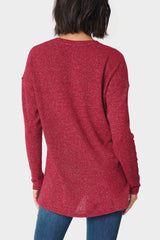The Back of a Woman wearing a V-Neck Shimmer Tunic with High Low Hem Burgundy