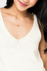 Close-up of Woman wearing Ivory GIGI Ribbed Sweater Shell