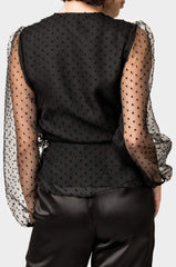 Back of Woman wearing Surplice Wrap Top with Organza Dot Sleeve in Black