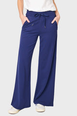 Woman modeling Essential Perfect Ponte Wide Leg Pant in Navy blue styled casual for everyday lounge