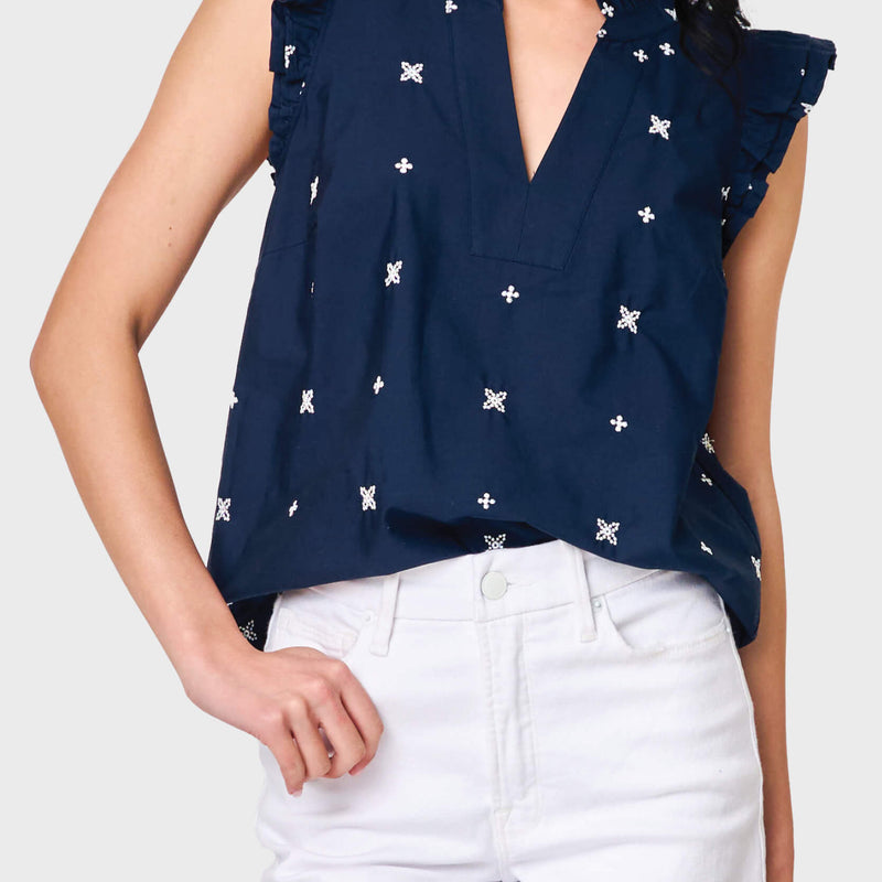 Woman modeling Decked Out Day Top in navy embroidered styled for work and everyday