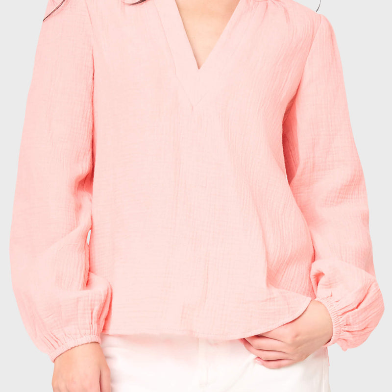 Woman modeling Meadow Bracelet Sleeve V-Neck Gauze Top in peach pink styled for everyday 