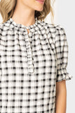 Close-up of women wearing the Ruffle Placket Dianthus II Blouse