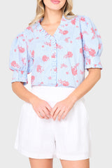 Woman modeling Iris Ruffle Front Button Down Top in Nautical Rose stripe print, styled for summer, vacations, and everyday