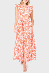 Woman modeling Notch Neck Flutter Sleeve Maxi Dress in Blossom Haze coral floral styled for work and everyday