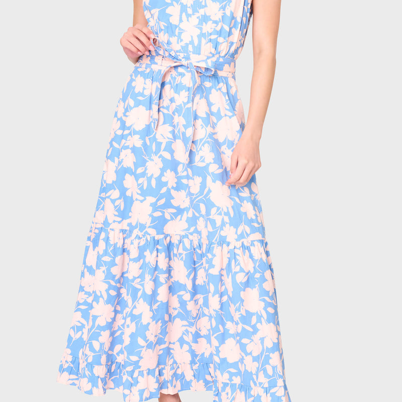 Woman modeling Notch Neck Flutter Sleeve Maxi Dress in Jardin Bleu floral print styled for work and weekends