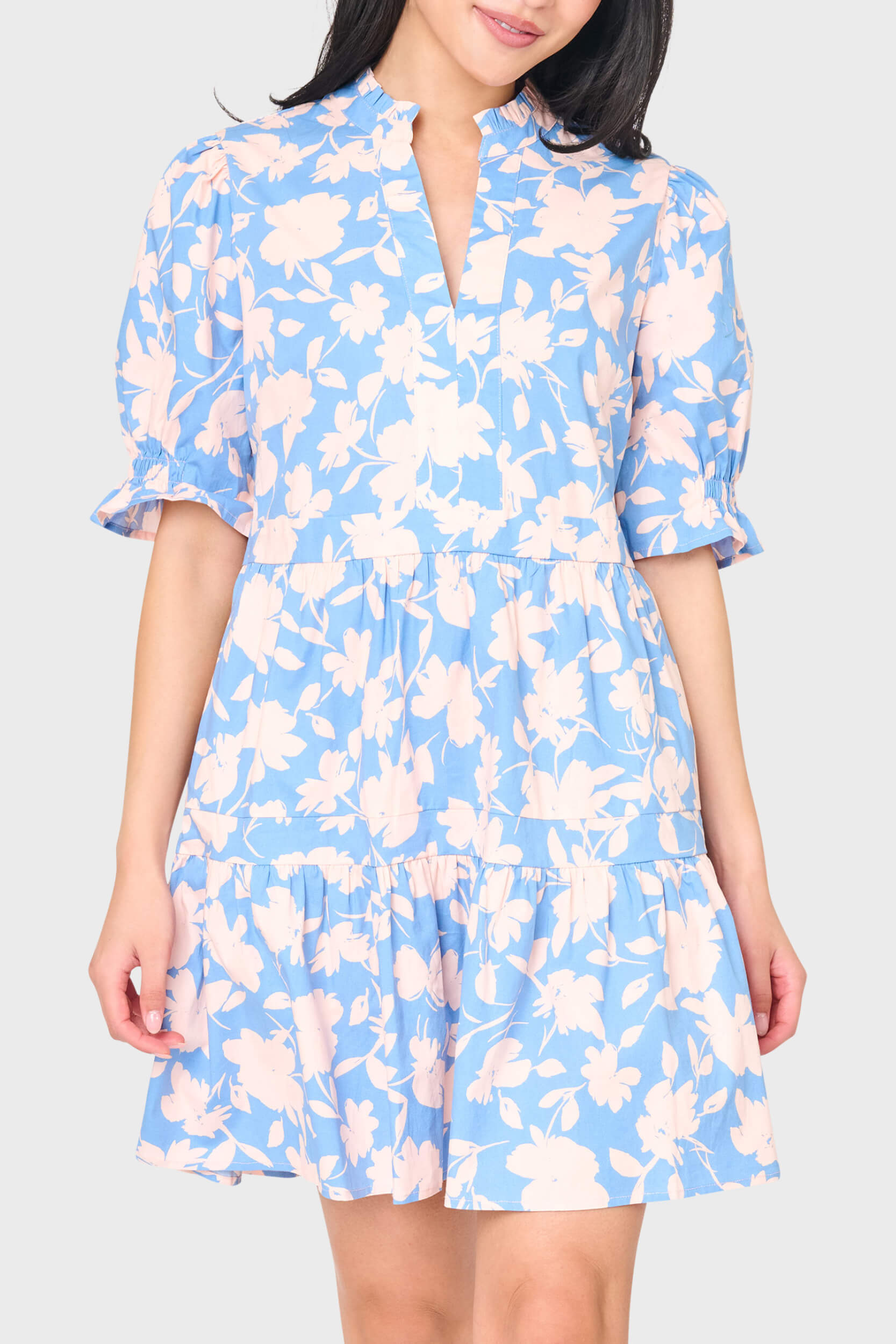 Woman modeling Puff Elbow Sleeve Decked Out Day Dress in Jardin Bleu blue floral styled for everyday