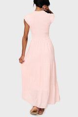 Back of Woman modeling Flutter Sleeve Smocked V Neck Tiered Maxi Dress in Pearl blush pink