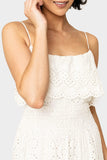 Close-up of women wearing the Elan Strappy Eyelet Tiered Midi Dress in white