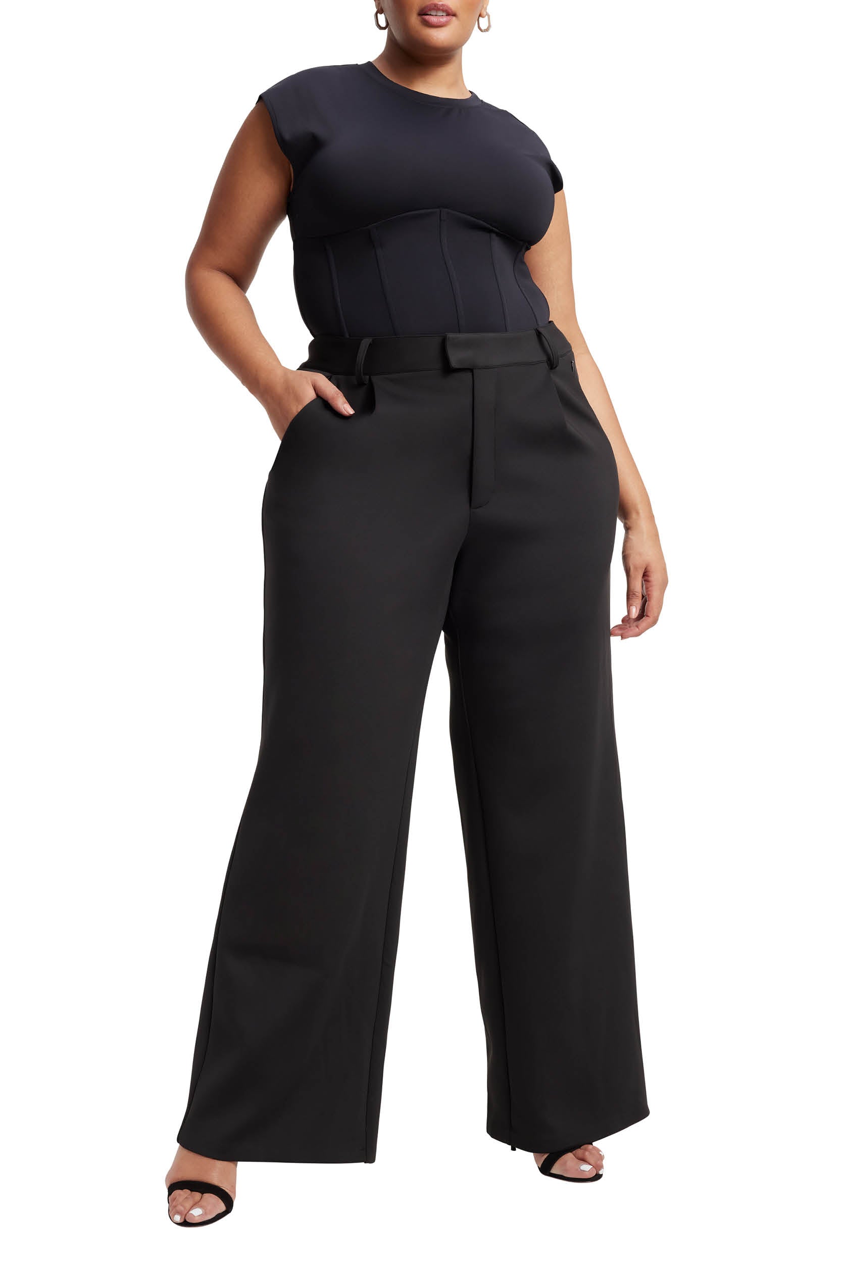 Front of women wearing the Good American Scuba Trousers