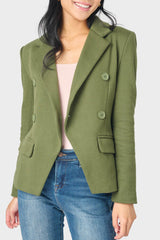 Front of women wearing double breasted blazer in green