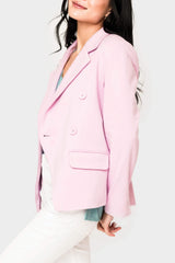 Side of Women wearing pink blazer