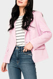 Women wearing pink blazer