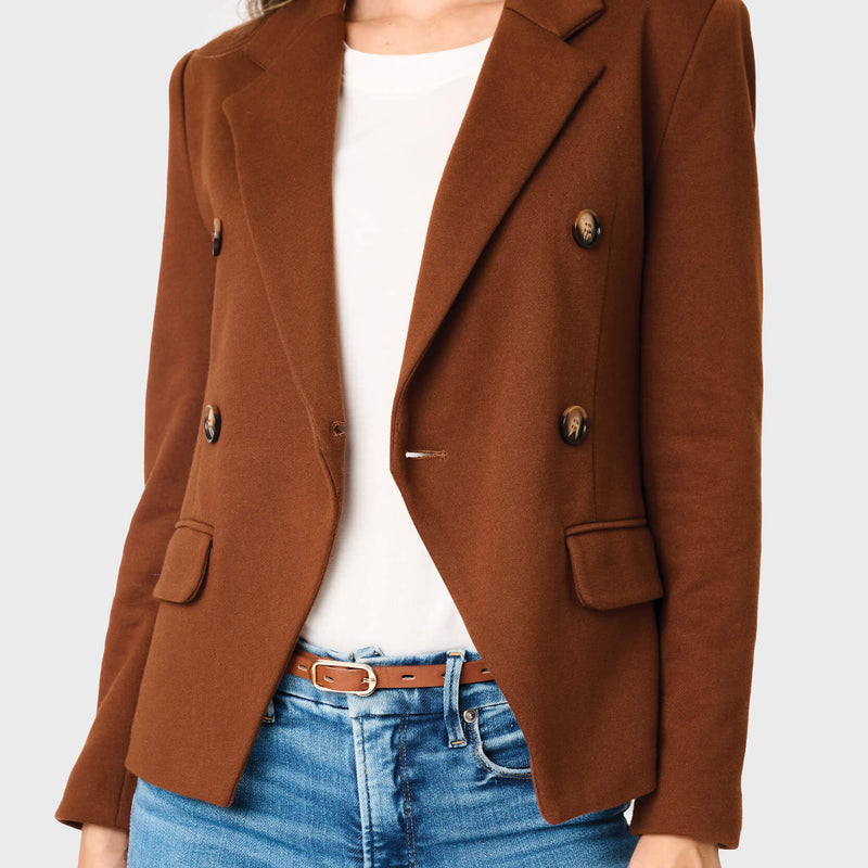 Woman modeling Double Breasted Blazer in Saddle brown styled business casual