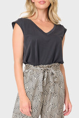 Woman modeling The Favorite Luxe Essentials V-Neck Tee in Black styled for business casual layering