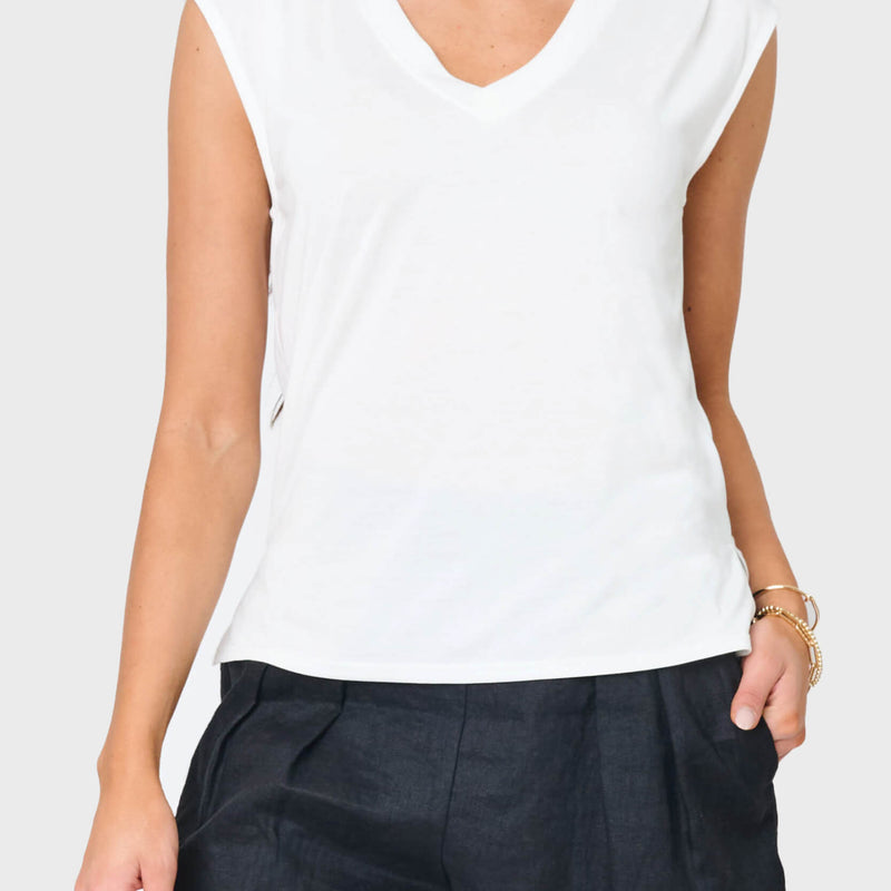 Woman modeling The Favorite Luxe Essentials V-Neck Tee in white styled for lounging and weekends