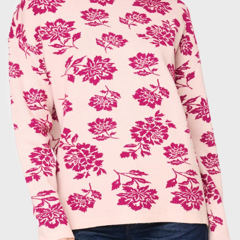 Woman modeling Intarsia Slouchy Luxe Sweater in Cerise Pink floral styled business casual for work