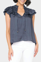 Front of women wearing the Reset By Jane Ruffled Yoke Crinkle Blouse in navy