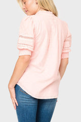 Back of Woman modeling Dianthus Henley Puff Sleeve Pleated Blouse in light Pink Smoke styled business casual 
