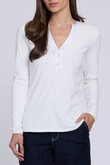 Woman modeling NYDJ Emery Ribbed Henley in Optic White style everyday casual