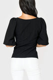 Back of women wearing the Balloon Sleeved V-Neck Textured Top in black