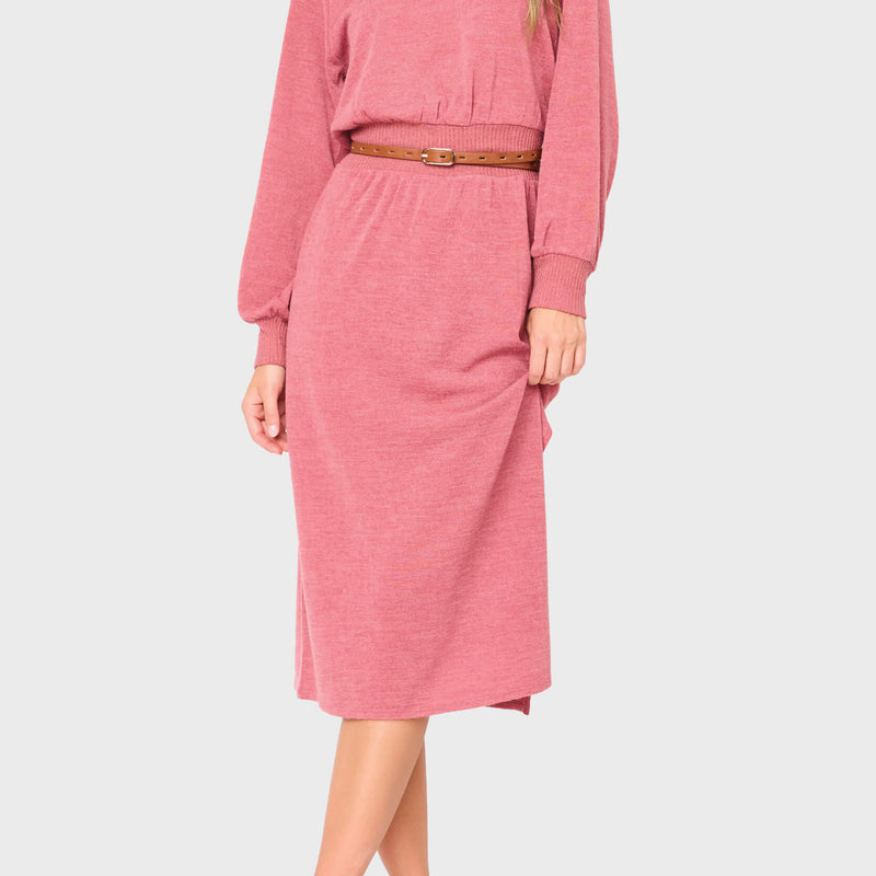 Woman modeling Long Sleeve V-Neck Midi Sweater Dress in light mauve red styled for work business casual