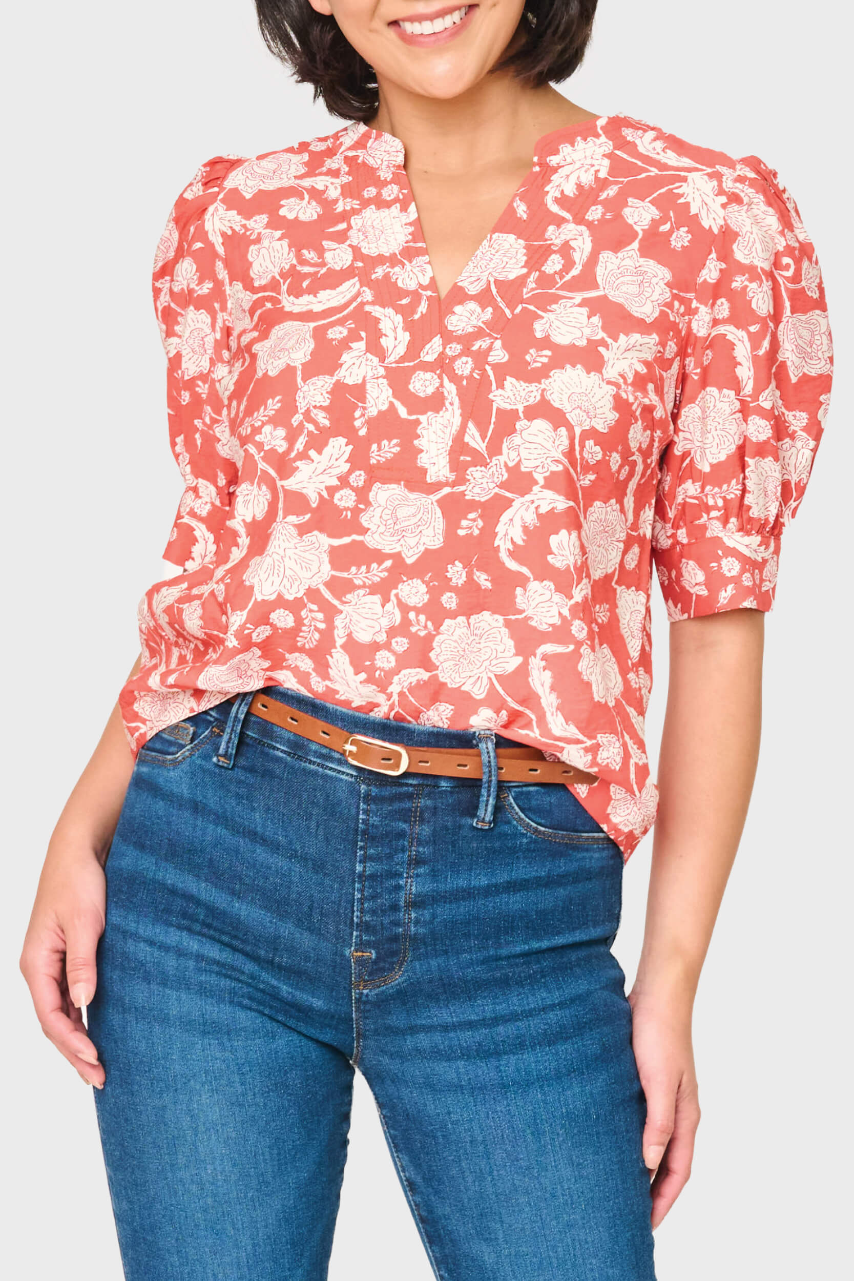 Woman modeling Notch Neck Pullover Puff Sleeve Blouse in Desert Rose Garden floral print styled for work to weekend