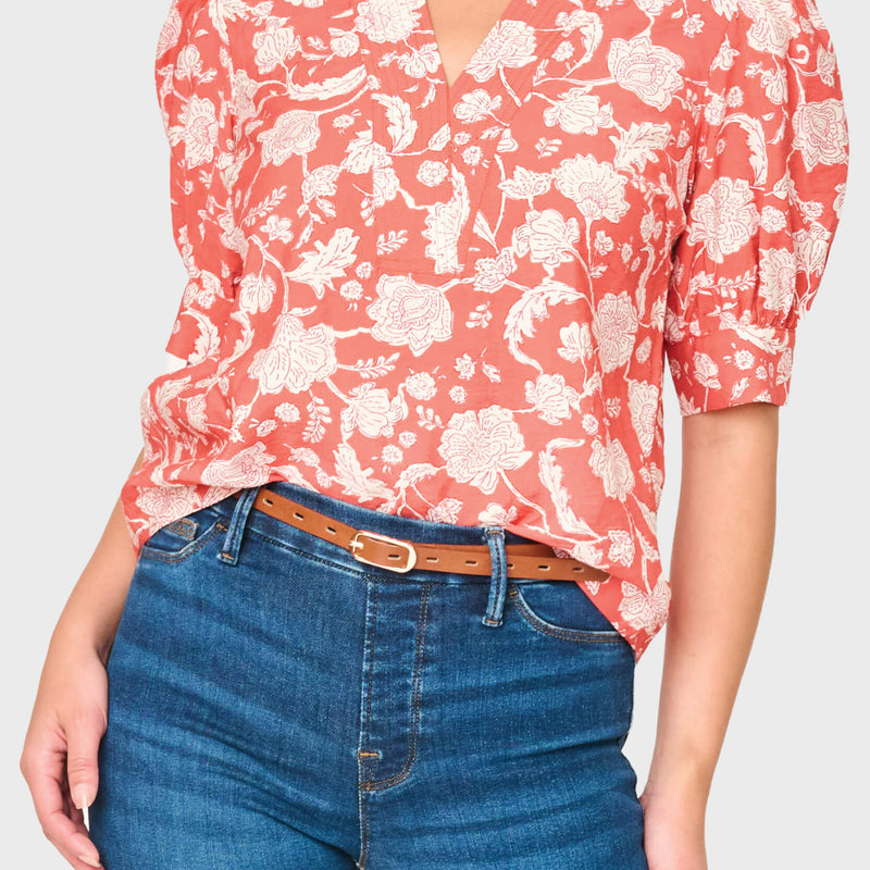 Woman modeling Notch Neck Pullover Puff Sleeve Blouse in Desert Rose Garden floral print styled for work to weekend