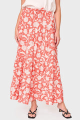 Woman modeling Tiered Ultra Maxi Skirt in Desert Rose Floral print styled for everyday, vacation, and work